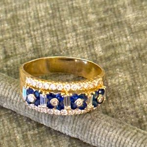 Incredible 14K gold band diamonds and sapphires.  Size 11